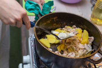 fry mushrooms in a pan