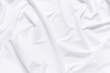 Obraz premium White fabric texture background. Cloth soft wave. Creases of satin, silk, and cotton.