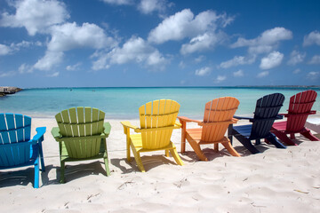 Colorful beach chairs on Aruba coast