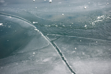 ice forms on the surface of the lake © eugen