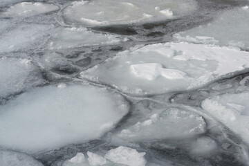 ice forms on the surface of the lake © eugen