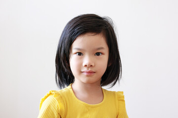 Little asian kid girl portrait on white background