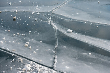 ice forms on the surface of the lake © eugen
