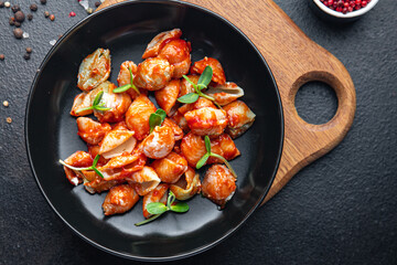 pasta tomato sauce no meat conchiglie shells healthy meal food vegan or vegetarian food snack on the table copy space food background rustic top view