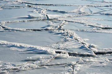 ice forms on the surface of the lake © eugen