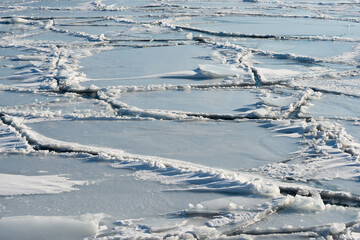 ice forms on the surface of the lake © eugen
