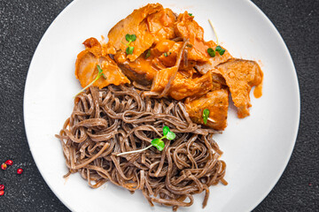 soba buckwheat noodles meat tomato sauce meal food snack on the table copy space food background 