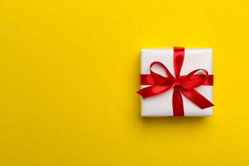 Top view of gift box on color background