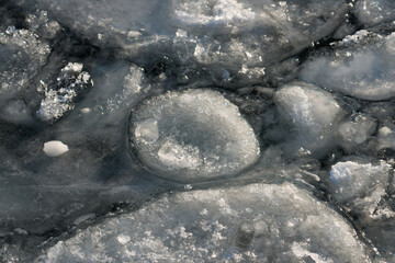 ice forms on the surface of the lake © eugen
