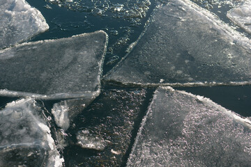 ice forms on the surface of the lake © eugen