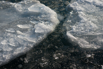 ice forms on the surface of the lake © eugen