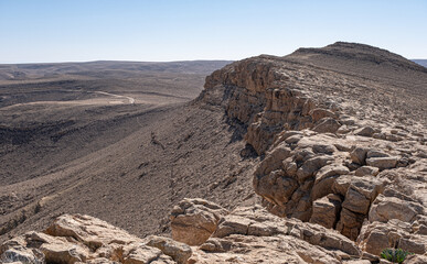 View of Ramon Crater western end as seen from Mount Ramon, a 500 m deep, the world's largest erosion cirque, located in the Negev Desert, south of Beer Sheba, Israel.