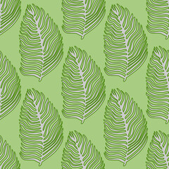 Organic palm leaf seamless pattern with hand drawn foliage print. Simple color background. Vector illustration for seasonal textile.