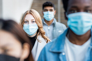 Multiracial people in the city wearing face mask - obrazy, fototapety, plakaty