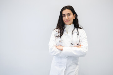 Portrait of confident female doctor with arms crossed