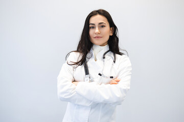 Portrait of confident female medic with arms crossed