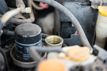 Motor oil refuel inlet valve of the car engine, transportation and vehicle part photo. Selective...