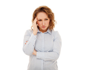 Young sad businesswoman with curly hair standing over white background holding her head thinking