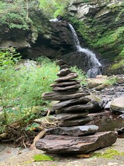 waterfall in the forest and zen stones at waterfall