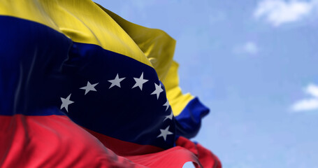 Detail of the national flag of Venezuela waving in the wind on a clear day