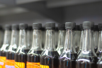 Varnish, paint and drying oil in bottles.