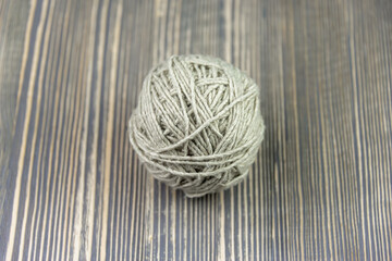 Threads in a ball on the table.