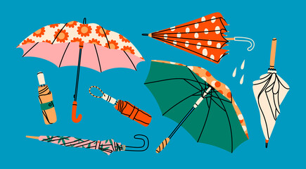 Set of different Umbrellas in various positions. Open and folded umbrellas. Various prints. Hand drawn colored Vector illustration. Cartoon style. Design templates. All elements are isolated © Dariia