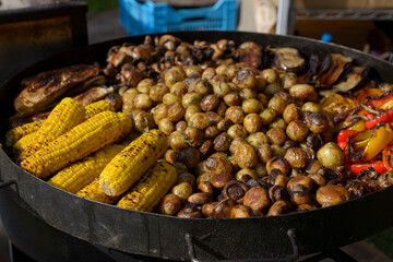 Corn and mushroom barbecue roasted on metal grill. Diet vegan bbq.