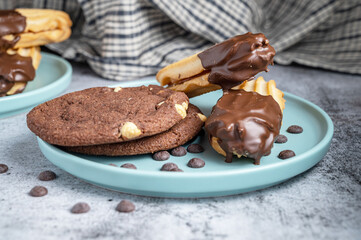 Dark chocolate coated half digestive biscuit with chocolate cookies and chips for loved ones valentines day celebration.