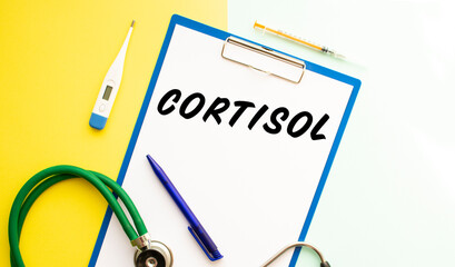 CORTISOL text on a letterhead in a medical folder on a beautiful background.