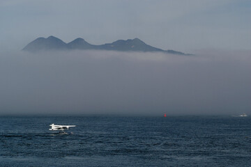 A Float Plane Taxis Through the Water in Tofino on Vancouver Island in Canada