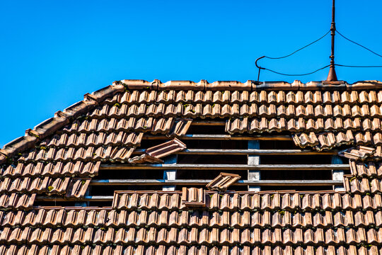 damaged roof at an old house