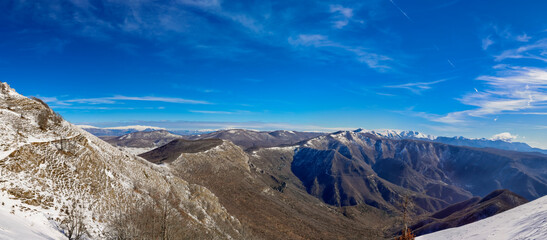 Panoramic view of snow-capped peaks of the Italian Central Apennines.