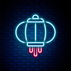 Glowing neon line Korean paper lantern icon isolated on brick wall background. Colorful outline concept. Vector