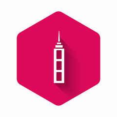White Skyscraper icon isolated with long shadow. Metropolis architecture panoramic landscape. Pink hexagon button. Vector