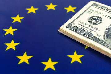 Money over the Europe union flag. Criminal and crime, corruption concept. Outlaw and social problem background photo