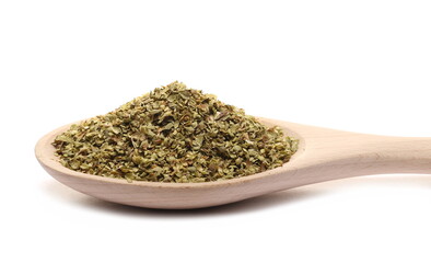 Pile of dried oregano leaves in wooden spoon isolated on white 