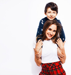 lifestyle and people concept, little cute boy with teenage girl posing together cheerful happy smiling isolated on white background