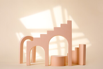 Cream-colored background with a white shape behind for product commercial.