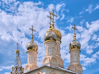 Fototapeta na wymiar Ryazan, Russia. Cupola of Church of the Transfiguration of Christ (Spas on the Yar church) on the background of blue sky with white clouds in sunny day. The church was built in 1695. 