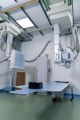 Fototapeta na wymiar Radiotherapy equipment in modern hospital empty room. Scanning xray.