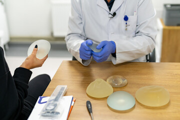 Plastic surgery silicon models. Woman cosmetic size implants correction.