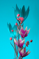 abstract flowers on a blue background, colorful buds and stems, studio shot.