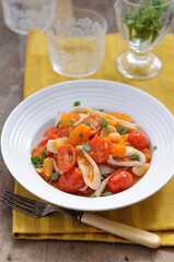 Sauteed Squid with Cherry Tomatoes, Garlic and Basil Leaves