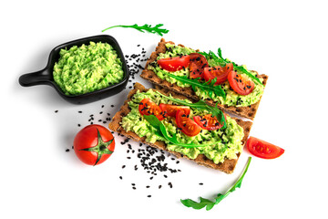 Avocado sandwich with avocado cream and rye crisp bread for snack. Fiber, fitness and diet food....