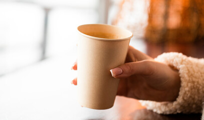 person holding a cup of coffee