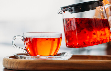 cup of tea with cinnamon. Red tea. Cafe