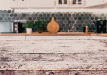 Fototapeta na wymiar blurred kitchen interior and vintage desk space