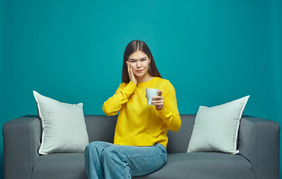 Toothache. Young Girl Touches Cheek Suffering Sudden Tooth Pain From Hot Drink. Dental Clinic, Medical Insurance Ad