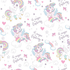 Cute joyful unicorns with lettering vector seamless pattern